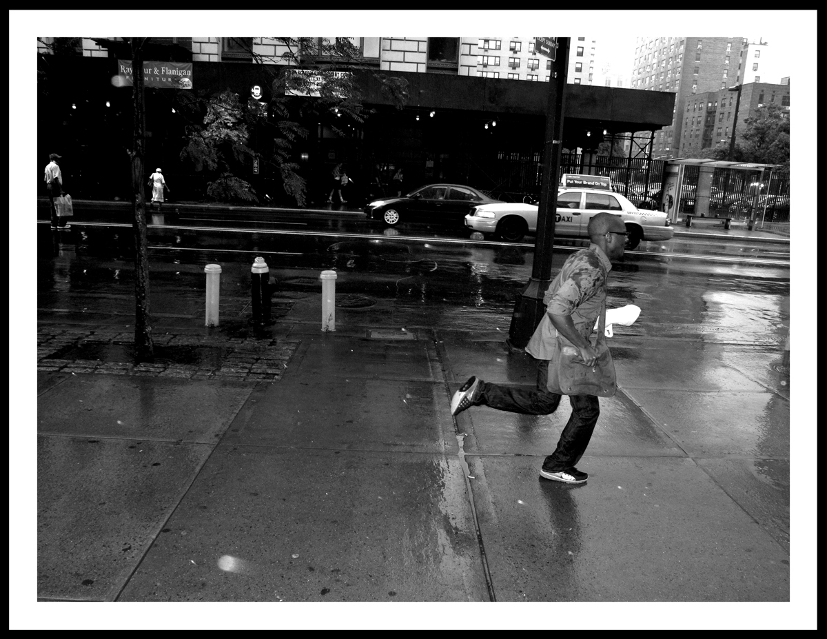 Man attempting to outrun this afternoons rain.