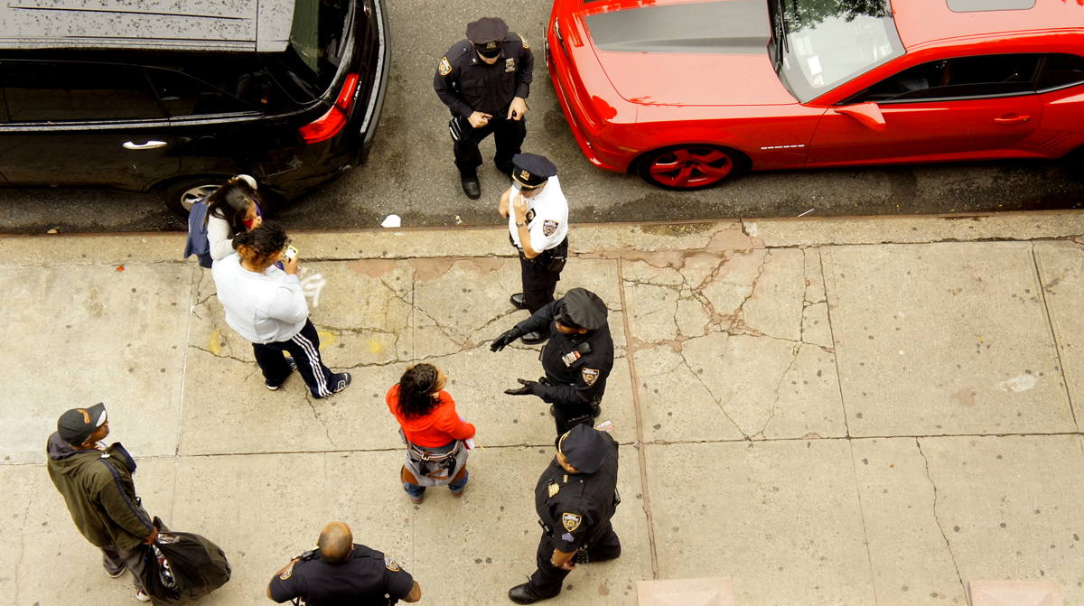 loook out of the window; the police are downstairs