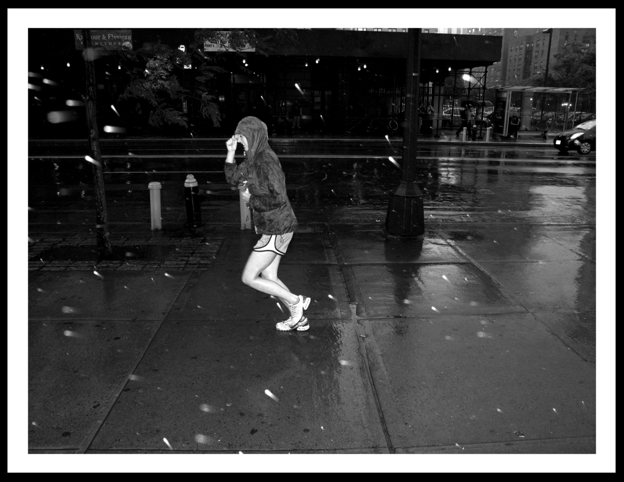 Woman running in rain