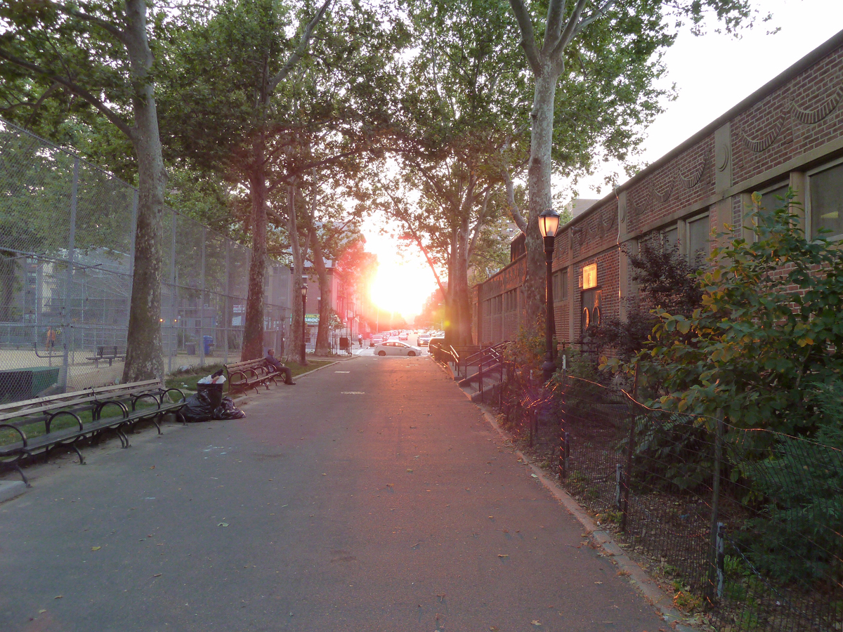 sunset over northern manhattan mid july